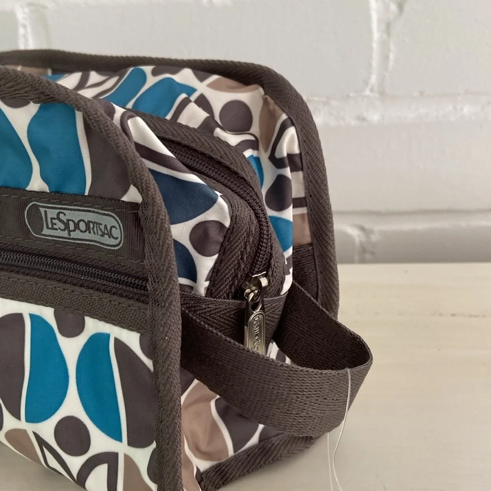 New With Tags LeSportsac Blue/Brown Patterned Cosmetic Travel Overnight Pouch